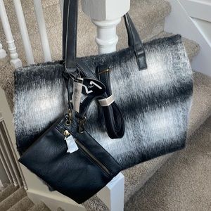 Wilson leather reverisble bag with with black leather small pouch. NWT.